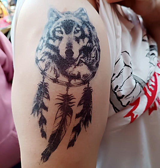 Jagua tattoo de tête de loup indien d'amérique en attrape rêve - Intuition et liberté